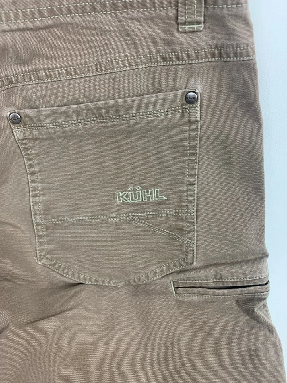 Kuhl Kanvus Jean Brown Pants Mens 34 stretch Born in the mountains Tapered